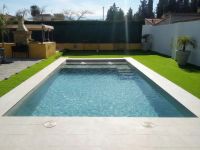 Piscina de obra con agua mineralizada Magne-System en Serena Pools.